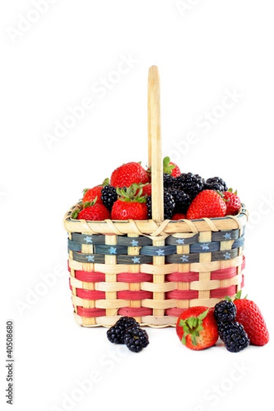 Obraz Patriotic basket of fresh strawberries and blackberries isolated on white with copy space.