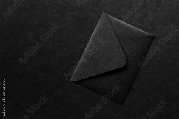 Obraz Black paper envelope on black background