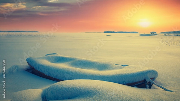 Obraz Winter sunset landscape with lonely snow covered boat
