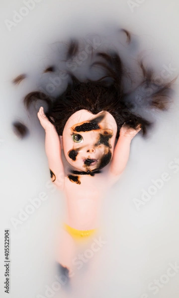 Obraz Submerged Doll in Cloudy Bath Water