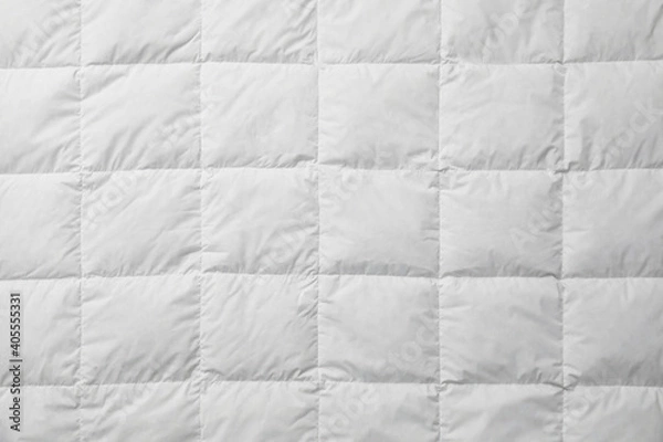 Obraz Soft quilted blanket as background, top view