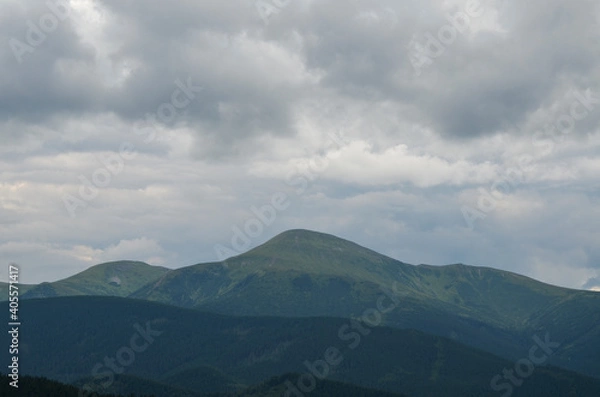Fototapeta Part of Chornohora range with the highest mountain of Ukraine Hoverla in cloudy summer day. Panoramic view, Carpathian Mountains, Ukraine