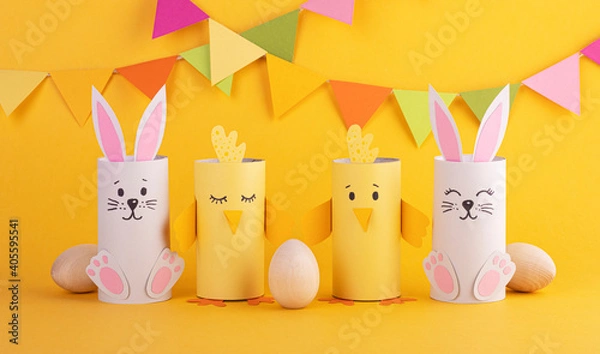 Obraz cute easter bunnies and paper birds with handmade Easter eggs. background for the Easter holiday