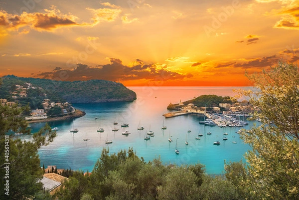 Fototapeta View of the famous Soller Port Marina and Dockland illuminated by sunset light in Palma de Majorca in Spain in summer season