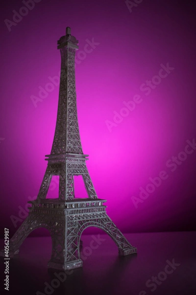 Fototapeta Colorful Eiffel tower on a lighted surface 