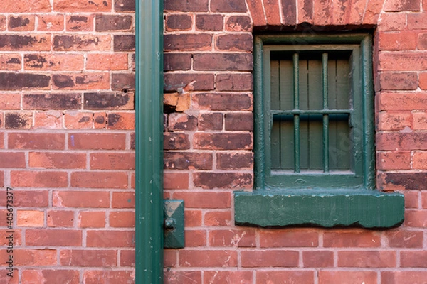 Fototapeta Old red brick building backdrop