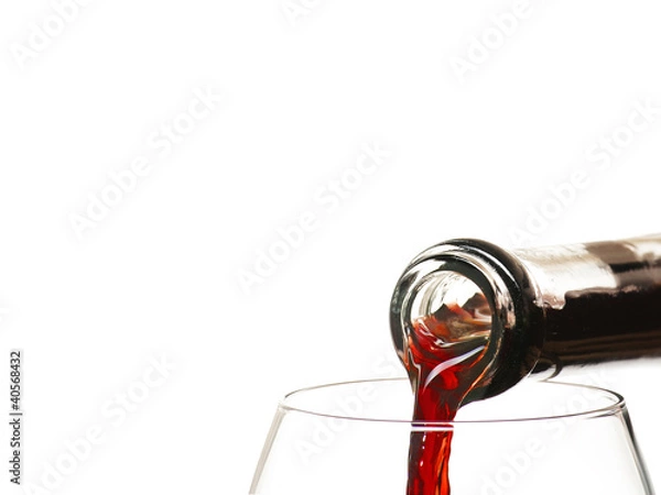 Obraz red wine being poured into glas