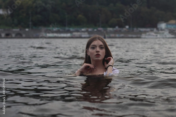 Fototapeta Women in sport outfin after swimming