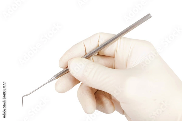 Obraz Hand mit Zahnarztsonde