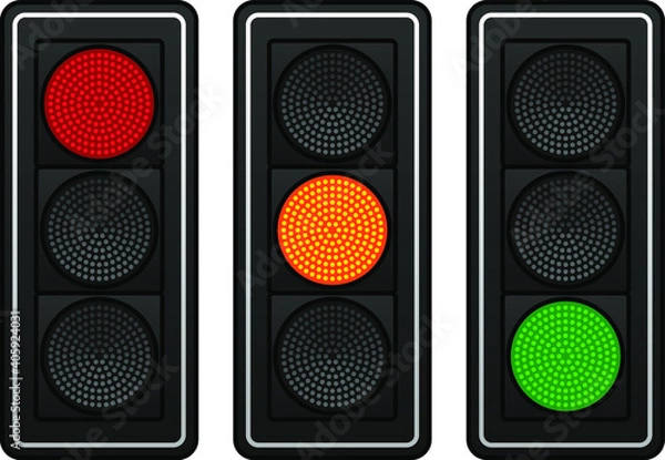 Fototapeta Three sets of LED traffic lights showing red, amber or green lights.