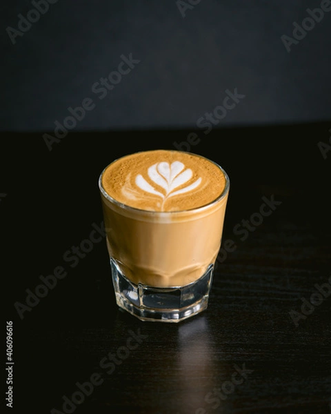 Fototapeta cortado latte on a table simple background