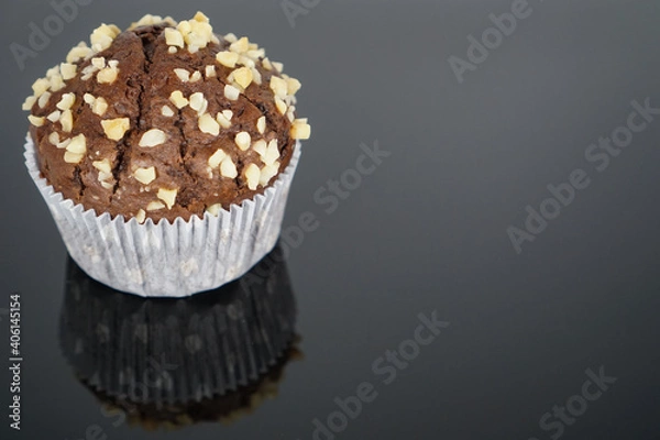 Obraz chocolate muffin on a black background	
