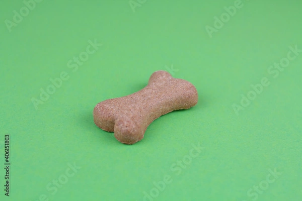 Fototapeta dog food bones on green background pattern