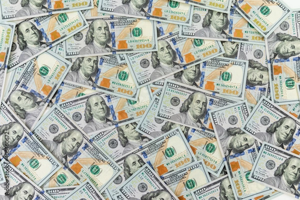 Fototapeta Texture of US dollars. Background of one hundred dollar bills.