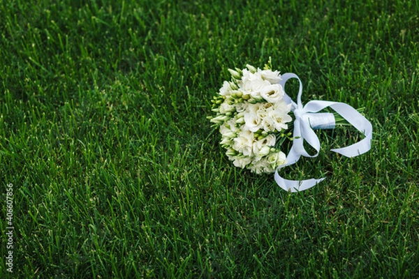 Obraz Wedding details. wedding bouquet of various flowers on the grass