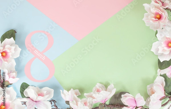 Fototapeta Magnolia branch on a multicolored background. postcard March 8, Mother's Day, happy Birthday. space for text.