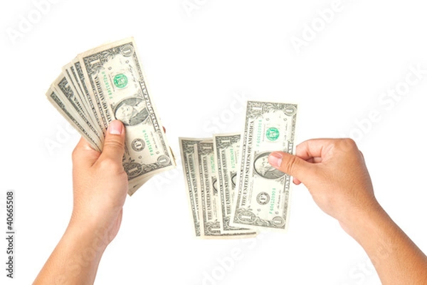 Obraz Hand with dollars on white background