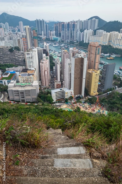 Fototapeta Panoramic Aerial view over Tin wan, Aberdeen and Ap Lei Chau district seen from Hong Kong Trail sec. 2, This is a popular hiking route for People living healthy active lifestyle outdoors.
