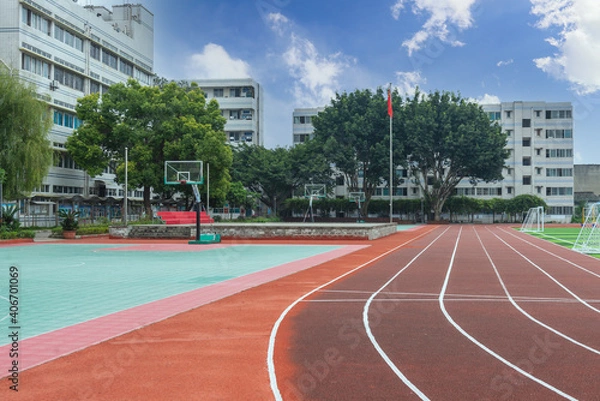 Fototapeta Empty campus with playgrounds and running tracks