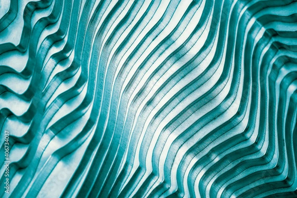 Fototapeta Abstract architecture closeup background. Metallic blue stainless steel or cast aluminium detail macro photo wallpaper. Selective focus, blurred foreground.