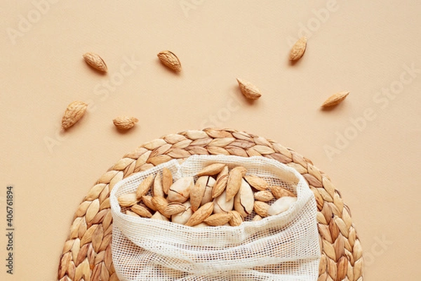 Obraz The concept of Zero waste. Reusable bag with nuts. Ecology and conservation of environment.