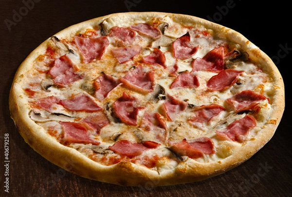Obraz Pizza prosciutto e funghi with ham and mushrooms - isolated