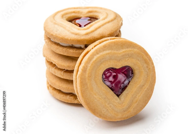 Fototapeta Cookies. Cookie Hearts shape Red jam or strawberry jelly inside biscuit cookie. Homemade baking. Sweet bakery. Top view on white background.