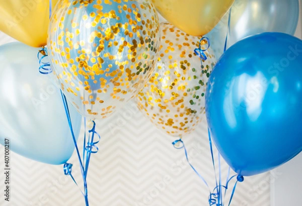 Obraz Blue and transparent balloons with golden confetti on zigzag wallpaper background