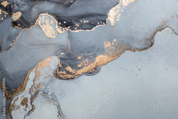 Fototapeta Luxury abstract fluid art painting in alcohol ink technique, mixture of black, gray and gold paints. Imitation of marble stone cut, glowing golden veins. Minimalistic design.