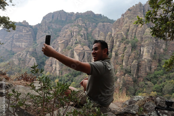 Obraz Man in the mountain "Tepozteco" taking a selfie