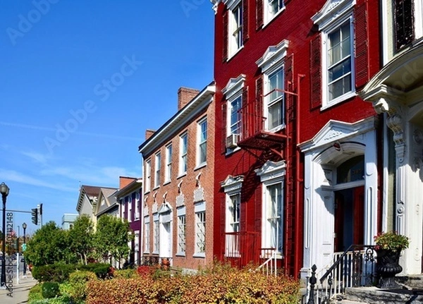 Fototapeta Cityscape of Geneva, New York. Historic row houses in downtown. Well maintained buildings with colorful paintings. A charming small town in America, has been on Playful City USA list.