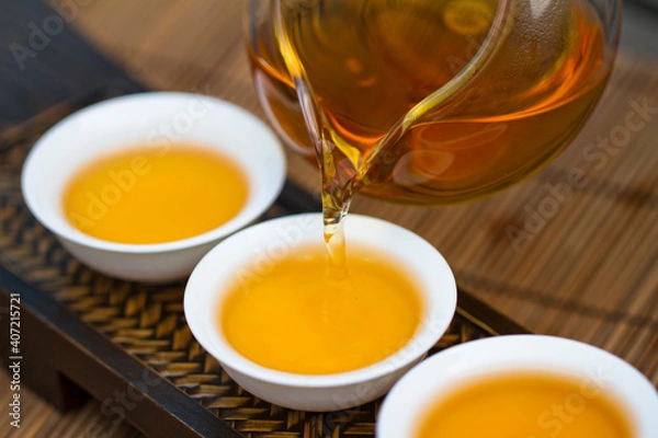 Obraz Tea pouring into tea cup