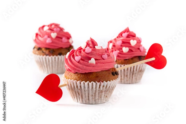 Fototapeta Cupcake decorated with sugar hearts and a cupid arrow for Valentine's Day