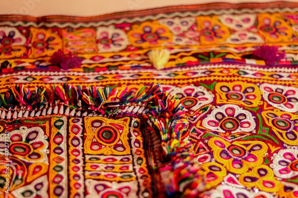Obraz handwork embroidery,Handmade embroidery art. Traditional Indian handmade embroidery art,selective focus,mirror work colorful handmade ahir bharat,Kutch-gujarat