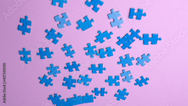 Obraz scattered puzzle pieces on colored background