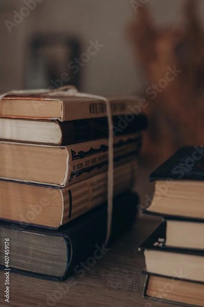 Fototapeta stack of books on a table