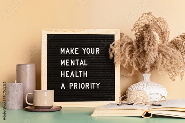 Obraz Make your mental health a priority motivational quote on the letter board. Inspiration psycological text