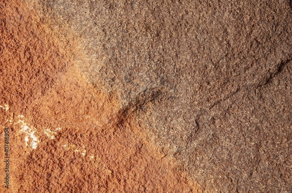 Fototapeta Closeup shot of textured red rock