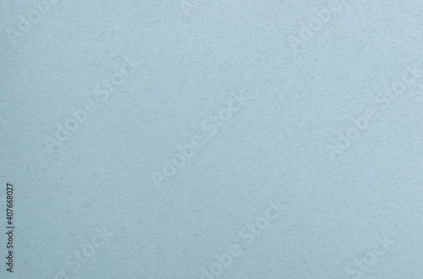 Fototapeta Blue grainy paper background, design element.