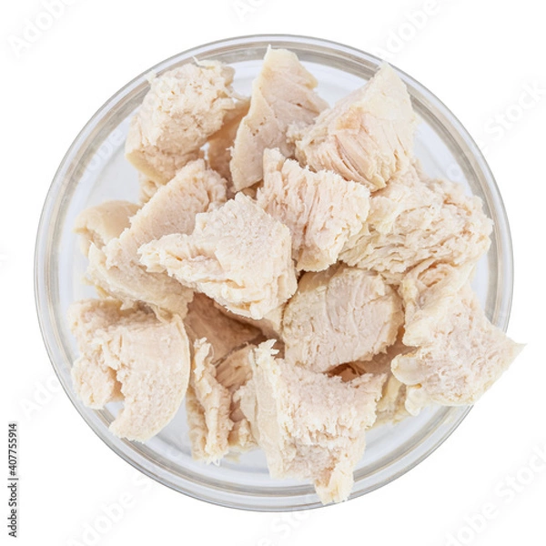 Obraz Pieces of boiled chicken breast in bowl isolated on white background. Top view