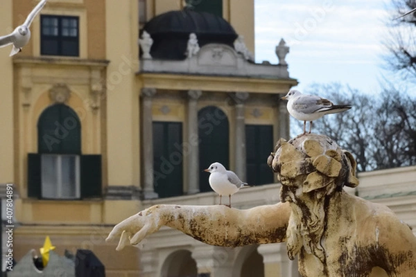 Fototapeta 銅像にとまる鳥