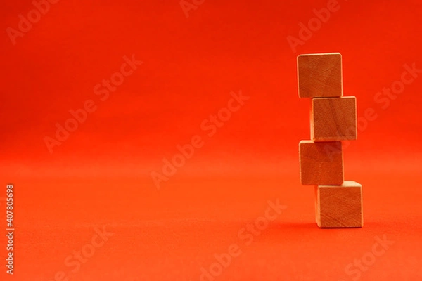 Obraz Mockup 4 wooden cube block object on red background and copy space - Text message Word Editor - 
 4 letter Template        