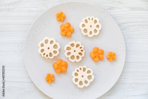 Obraz 人参と蓮根の飾り切り、花形とねじり梅