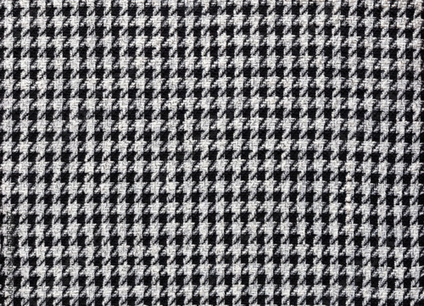 Fototapeta Fashionable fabric made of wool with pepita pattern in black and off-white, textile background image