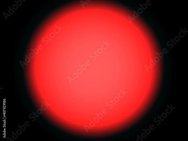 Fototapeta Large red circle on a black background.