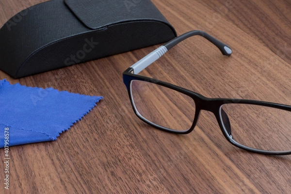 Obraz black glasses with case
