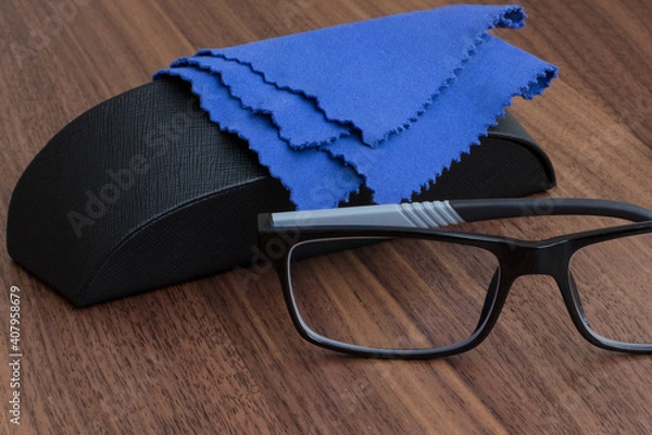 Obraz black glasses with case
