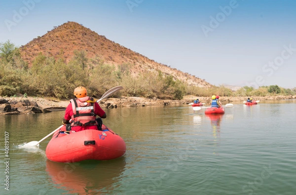 Fototapeta Rafting Paddling Boating On The River Kunene Namibia