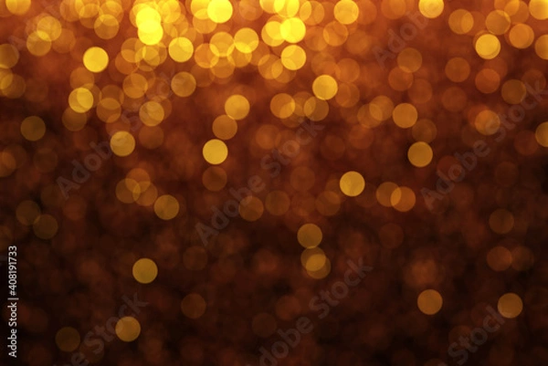 Fototapeta abstract blurred defocused gold yellow bokeh light background