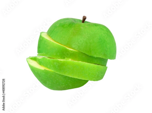 Fototapeta A green apple cut into slices
